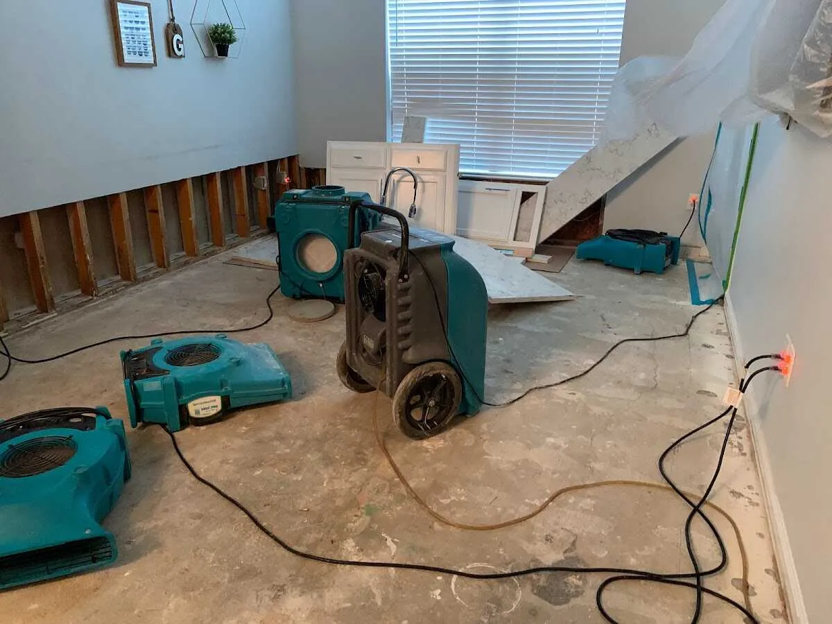 Dehumidifier in flood-cut room for Water Damage Restoration in Mooresville